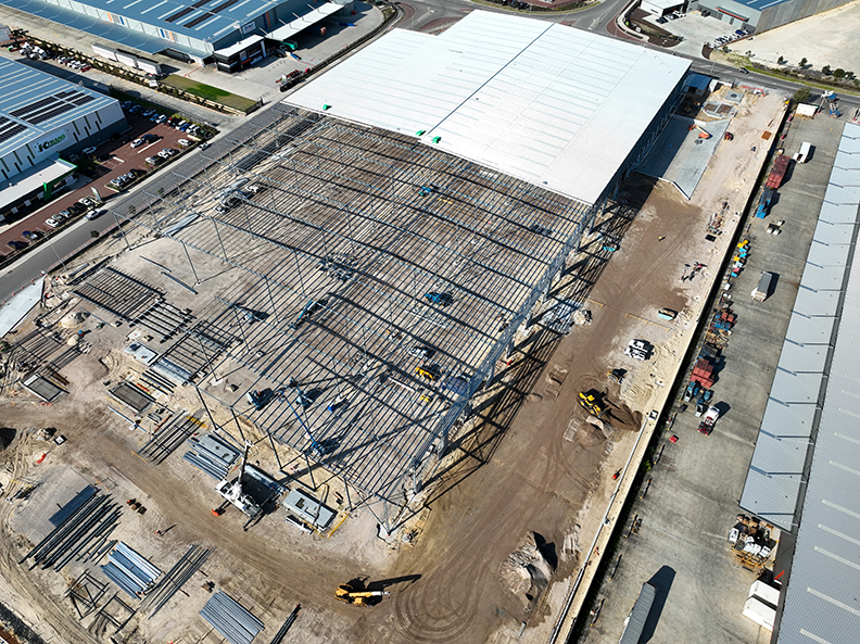 Silk K2 Distribution Centre, Roe Highway Logistics Park, Kenwick, Perth, Western Australia, Design & Construct Project, Capstone Construction, Industrial Warehouse, Office, Loading Dock, Carpark, Super Canopy, Development, Aerial, Silk DC Page