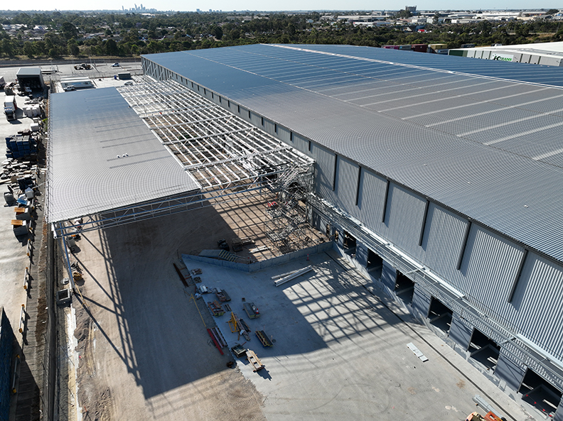 Silk K2 Distribution Centre, Roe Highway Logistics Park, Kenwick, Perth, Western Australia, Design & Construct Project, Capstone Construction, Industrial Warehouse, Office, Loading Dock, Carpark, Super Canopy, Development, Aerial, Silk DC Page