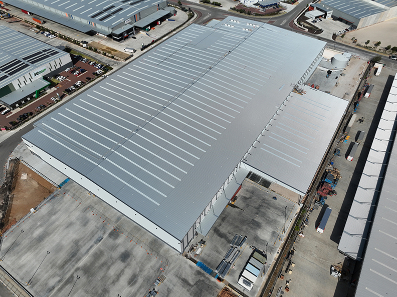 Silk K2 Distribution Centre, Roe Highway Logistics Park, Kenwick, Perth, Western Australia, Design & Construct Project, Capstone Construction, Industrial Warehouse, Office, Loading Dock, Carpark, Super Canopy, Development, Aerial, Silk DC Page